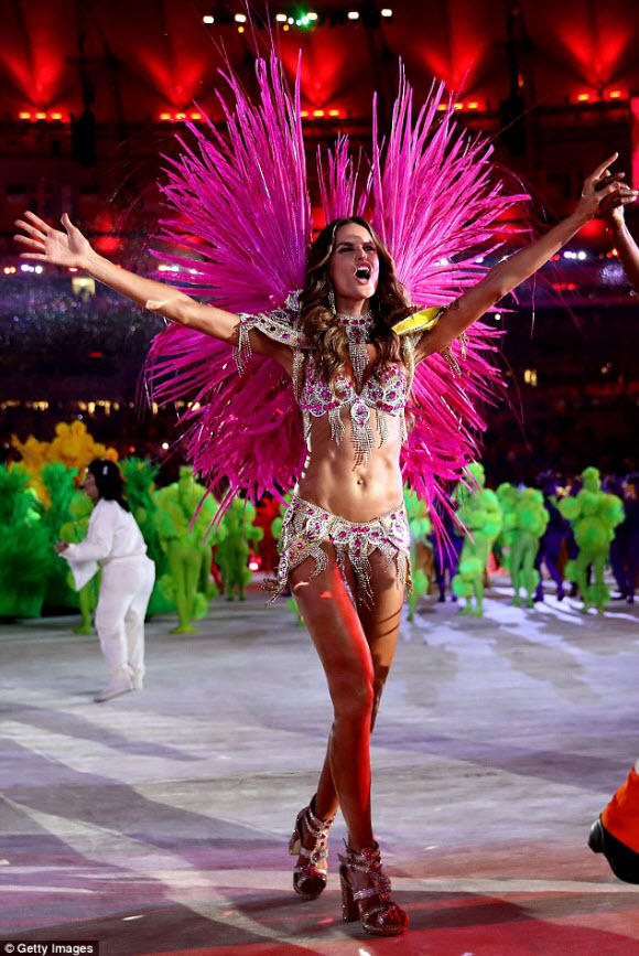 Izabel Goulart reveals almost all of her stunning figure in sexy carnival costume for Olympics Closing Ceremony