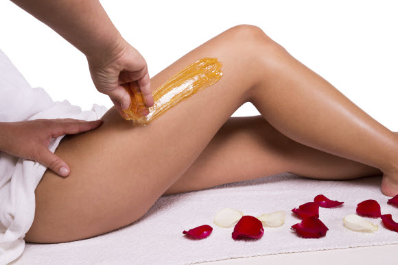 The Difference Between Waxing And Sugaring Body Hair Removal