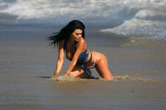 Melodi Milani Stormes The Beach And Injected Some Added Sexy Appeal During A Photoshoot